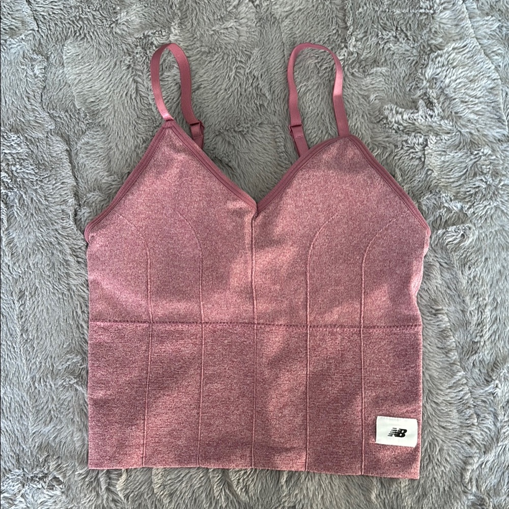 New Balance Pink Sports Bra with Adjustable Straps and Ribbed Texture